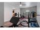 Home gym with various exercise equipment including weight bench and treadmill at 4568 Mantova Dr, Buford, GA 30519