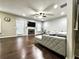 Spacious living room with fireplace and modern furnishings, perfect for relaxing and entertaining at 1015 Pebble Creek Trl, Suwanee, GA 30024