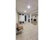 Spacious finished basement area with tile flooring, furniture, and finished carpentry at 1084 Whistle Dr, Austell, GA 30106