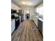 Modern kitchen with white cabinets, granite countertops, and stainless steel appliances at 1084 Whistle Dr, Austell, GA 30106