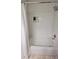 Clean white tiled shower with a bathtub and a modern shower head fixture at 1084 Whistle Dr, Austell, GA 30106