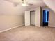 Spacious bedroom with carpeted floors, ceiling fan, a closet, and plenty of natural light at 128 Brookhaven Ln, Mcdonough, GA 30253