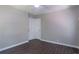 A well-lit bedroom with hardwood floors, a ceiling fan, and double door closet at 4684 City View Dr, Forest Park, GA 30297
