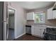 Efficient kitchen equipped with stainless steel appliances, granite countertops, and ample cabinet space at 4684 City View Dr, Forest Park, GA 30297