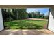 Expansive backyard view from the covered patio, offering a serene outdoor space at 500 Level Creek Rd, Sugar Hill, GA 30518