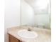 Bright bathroom with a single sink and spacious mirror at 5880 Trent Walk Dr, Lithonia, GA 30038