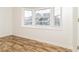 Bedroom featuring modern flooring and large window with lots of sunlight at 5880 Trent Walk Dr, Lithonia, GA 30038