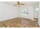 Bright living room with wood flooring and a large window to let natural light in at 5880 Trent Walk Dr, Lithonia, GA 30038