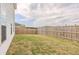 Spacious backyard enclosed by a wooden fence, providing privacy and ample space at 88 Oxford Ln, Kingston, GA 30145
