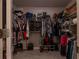Walk-in closet with clothing racks, shelving, and ample storage space at 88 Oxford Ln, Kingston, GA 30145