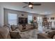 Bright living room features comfortable seating, natural light, and an adjacent dining area at 88 Oxford Ln, Kingston, GA 30145
