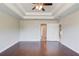 Main bedroom showcasing tray ceilings and an ensuite bathroom at 2378 Morgan Creek Rd, Buford, GA 30519
