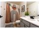 Stylish bathroom featuring decorative shower curtain, modern vanity, and eye-catching decor at 3482 Willow Meadow Ln, Douglasville, GA 30135