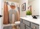 Modern bathroom featuring a sleek vanity and a stylish shower curtain at 3482 Willow Meadow Ln, Douglasville, GA 30135