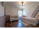 Charming bedroom with a crib and accent wall at 3482 Willow Meadow Ln, Douglasville, GA 30135