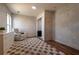 Bright room with neutral tones, a comfortable chair, and wood-look flooring for a cozy feel at 3482 Willow Meadow Ln, Douglasville, GA 30135