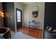 Open entryway with hardwood floors, a stylish console table, and contemporary decor at 3482 Willow Meadow Ln, Douglasville, GA 30135