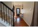Welcoming foyer with hardwood floors and staircase, offering a bright entryway at 3482 Willow Meadow Ln, Douglasville, GA 30135