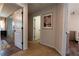 Hallway with multiple doorways to various rooms at 3482 Willow Meadow Ln, Douglasville, GA 30135