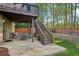 Backyard patio with wood deck, comfortable seating, and a view of the lush, fenced yard at 358 Nature Brook Se Walk, Smyrna, GA 30082