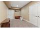 Finished basement space with neutral carpet, closet, and access doors at 358 Nature Brook Se Walk, Smyrna, GA 30082