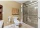Well-maintained bathroom featuring a toilet, and a glass-enclosed shower at 358 Nature Brook Se Walk, Smyrna, GA 30082