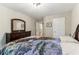 Bedroom with carpet and neutral walls, large dresser and a doorway to hallway at 358 Nature Brook Se Walk, Smyrna, GA 30082