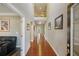 Inviting foyer featuring soaring ceilings, hardwood floors, and arched doorways at 358 Nature Brook Se Walk, Smyrna, GA 30082