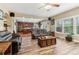 Bright, open-concept living room flows into a modern kitchen with stainless steel appliances at 358 Nature Brook Se Walk, Smyrna, GA 30082
