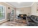 Cozy living room featuring with natural light, wood floors, and neutral color at 358 Nature Brook Se Walk, Smyrna, GA 30082