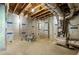 Exposed basement featuring exposed duct work, unfinished walls, and a concrete floor at 461 Maypop Ln, Woodstock, GA 30188