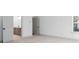 Bedroom view with neutral carpet, base molding, and featuring an ensuite bathroom at 461 Maypop Ln, Woodstock, GA 30188