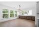 Bright dining room area with large windows and lots of counter and cabinet space at 461 Maypop Ln, Woodstock, GA 30188
