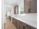 Spacious kitchen area with abundant counterspace and natural light at 461 Maypop Ln, Woodstock, GA 30188