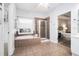 Elegant bathroom with a soaking tub, glass-enclosed shower, and tile flooring at 2069 Willow Chase Ct, Tucker, GA 30084