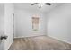 Bedroom with neutral carpet and a window with blinds providing natural light at 2069 Willow Chase Ct, Tucker, GA 30084