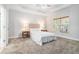 Bright bedroom with neutral tones, and a trey ceiling at 2069 Willow Chase Ct, Tucker, GA 30084