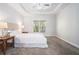 Bright bedroom with neutral tones, trey ceiling and plantation shutters at 2069 Willow Chase Ct, Tucker, GA 30084