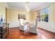 Bright dining room with a table, chairs, and wainscoting at 2069 Willow Chase Ct, Tucker, GA 30084