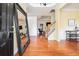 Spacious foyer with hardwood floors, staircase, and decorative mirror at 2069 Willow Chase Ct, Tucker, GA 30084