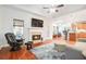 Inviting living room featuring a fireplace, hardwood floors, and a tray ceiling at 2069 Willow Chase Ct, Tucker, GA 30084