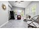 Bright sun room with exercise equipment and comfortable seating at 2069 Willow Chase Ct, Tucker, GA 30084