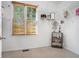 Bright walk-in closet featuring custom shelving, natural light, and neutral carpet at 2069 Willow Chase Ct, Tucker, GA 30084