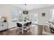 Lovely dining room area with modern pendant lighting and lots of light at 3377 Park Pointe Cir, Scottdale, GA 30079