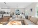Bright and airy living room and kitchen area featuring modern design elements at 3377 Park Pointe Cir, Scottdale, GA 30079