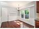 Dining area with wood floors and great natural light at 504 Baltimore Sw Ave, Lilburn, GA 30047