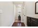 Hallway leading to a study or office with a hard surface floor at 2511 Day Break Way, Dacula, GA 30019