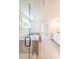 Spacious bathroom with glass shower, soaking tub, double vanity, and tiled floors at 2626 Radvell Ct, Decatur, GA 30034