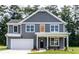 Charming two-story home with gray siding, white trim, and a welcoming front porch at 2626 Radvell Ct, Decatur, GA 30034