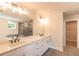Main bathroom with double vanity, quartz countertops, soaking tub and walk-in shower at 2626 Radvell Ct, Decatur, GA 30034